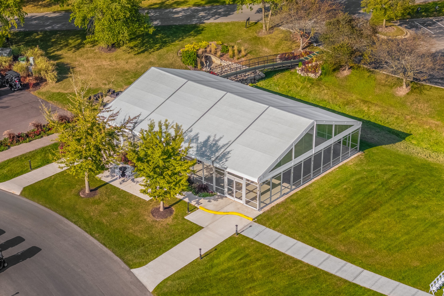 Aerial view of the modern glass-walled event tent at Mars Resort