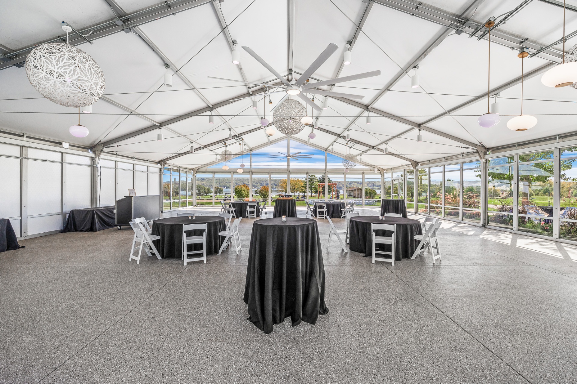 Wide interior view of the Mars Resort tent set with cocktail rounds