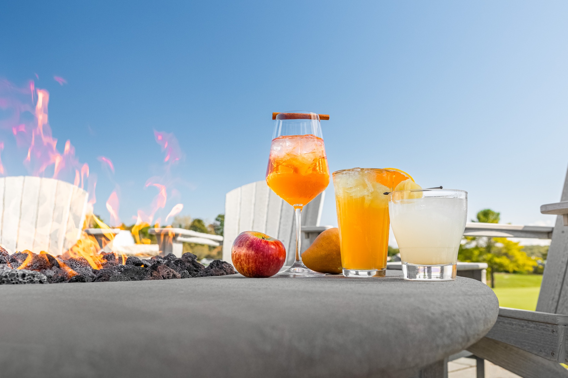 Cocktails by the firepit with lake view
