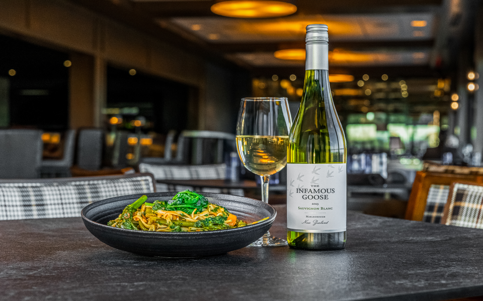 Pasta with sauvignon blanc in the dining room