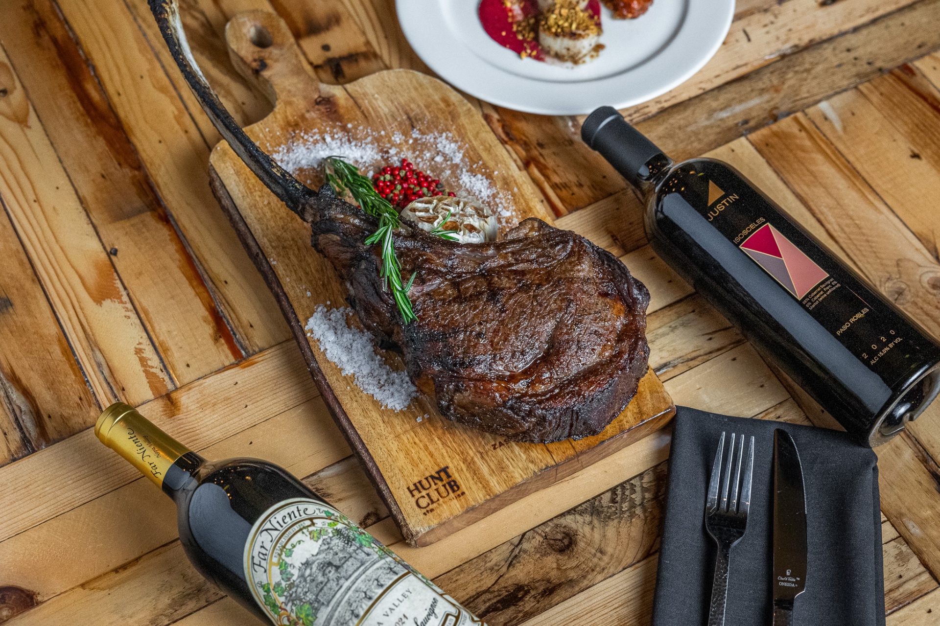 Tomahawk ribeye steak with wine pairings